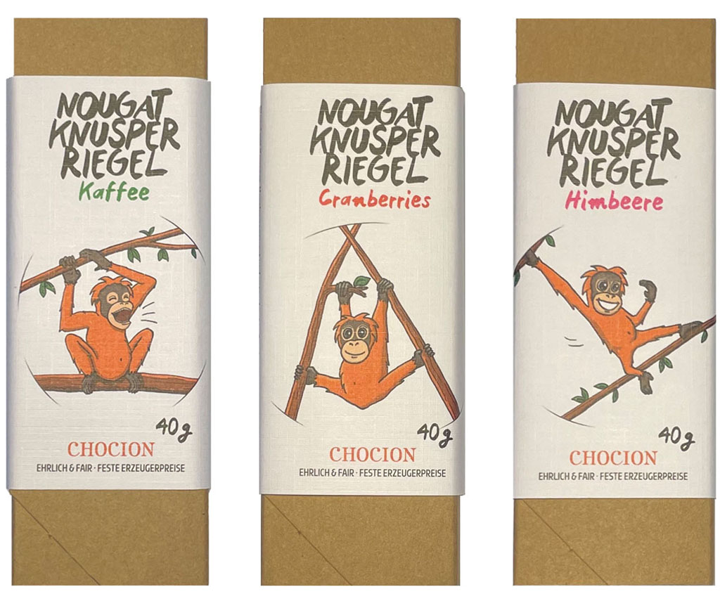 Abgebildet sind Produktbilder der drei Nougat-Knusper-Riegel, in den Sorten Himbeere, Cranberries und Kaffee.